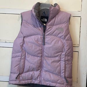 North face puffer vest. Gorgeous purple color for winter or spring.  Worn once